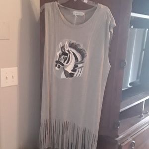 Long tee with cut out arm holes and tassels